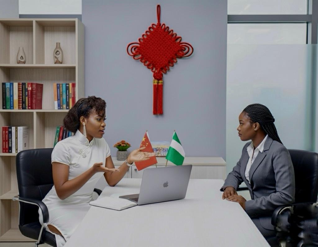 Nichi connect with a client discussing Chinese class